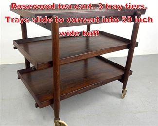 Lot 83 Poul Hundevad Vamdrup Rosewood tea cart. 3 tray tiers. Trays slide to convert into 59 inch wide buff