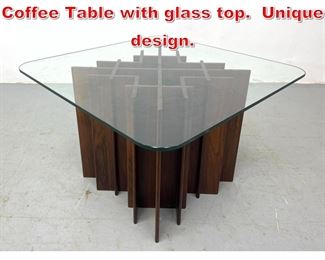 Lot 128 Danish Modern Rosewood Coffee Table with glass top. Unique design. 
