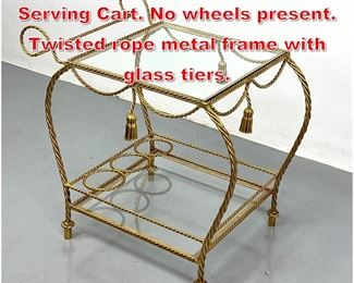 Lot 129 Gilt Metal Italian style Serving Cart. No wheels present. Twisted rope metal frame with glass tiers.