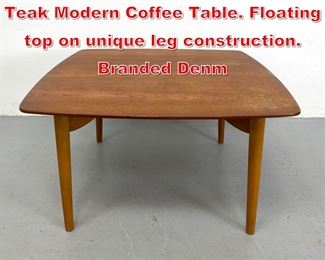 Lot 158 GEORGE TANIER Danish Teak Modern Coffee Table. Floating top on unique leg construction. Branded Denm