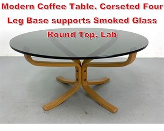 Lot 168 VATNE MOBLER Norway Modern Coffee Table. Corseted Four Leg Base supports Smoked Glass Round Top. Lab