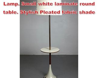 Lot 220 Modernist Tulip Base Floor Lamp. Small white laminate round table. Stylish Pleated fabric shade