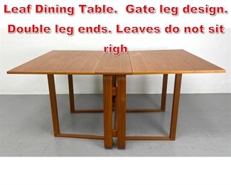 Lot 296 Danish Modern Teak Drop Leaf Dining Table. Gate leg design. Double leg ends. Leaves do not sit righ