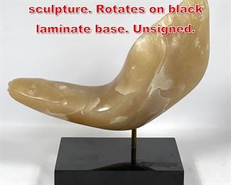 Lot 324 Carved stone fish sculpture. Rotates on black laminate base. Unsigned. 