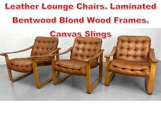 Lot 370 Set 3 Scandinavian Tufted Leather Lounge Chairs. Laminated Bentwood Blond Wood Frames. Canvas Slings
