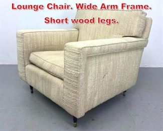 Lot 453 Modernist Upholstered Lounge Chair. Wide Arm Frame. Short wood legs. 