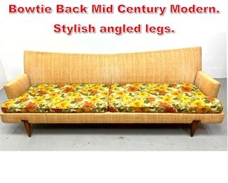 Lot 492 Long Paul McCobb Style Bowtie Back Mid Century Modern. Stylish angled legs. 