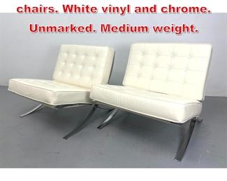Lot 521 Pr Barcelona Style Lounge chairs. White vinyl and chrome. Unmarked. Medium weight. 