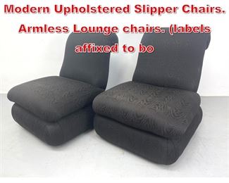 Lot 530 Pair of Donghia Post Modern Upholstered Slipper Chairs. Armless Lounge chairs. labels affixed to bo