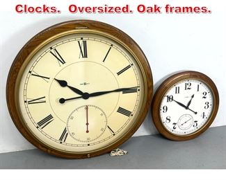 Lot 550 2pcs Howard Miller Wall Clocks. Oversized. Oak frames. 