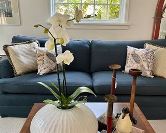 Planted orchids everywhere...custom down sofa, antique mirrors and details throughout