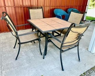 Tile top patio table and 4 chairs