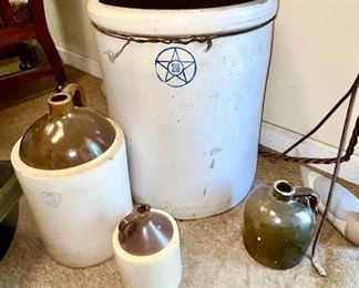 Close-up view of crocks (3 gal, 20 gal, 2 one gallons)