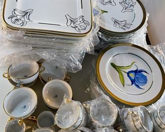 Hand painted gold and platinum porcelain dinnerware by Marc Blackwell