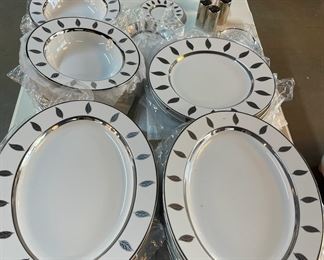 Hand painted platinum porcelain dinnerware by Marc Blackwell