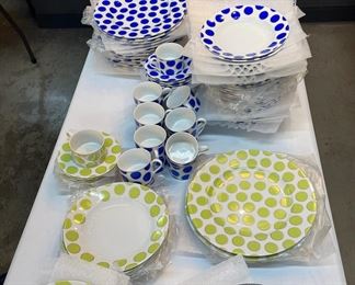 Polka dots and striped dinnerware in many colors by designer Marc Blackwell
