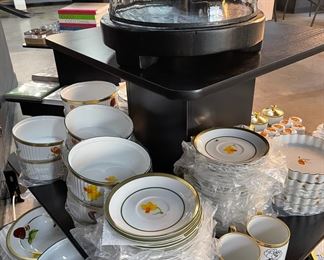 Hand painted dinnerware by designer Marc Blackwell