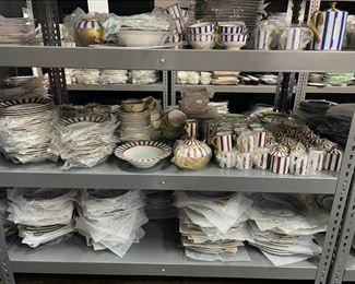 Hand painted gold and platinum dinnerware by Marc Blackwell