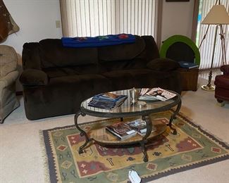 double recliner couch and Native American rug