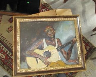 African-American banjo or guitar player