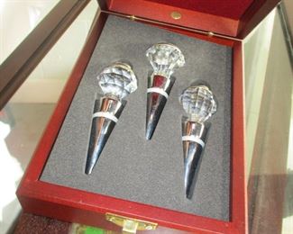 Wine bottle stoppers in case