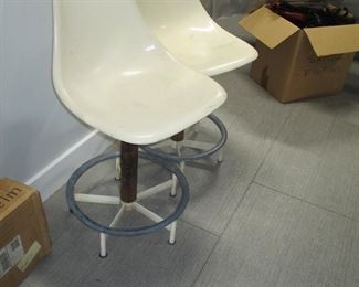 MCM plastic bar chairs.  Rago Auction sold these exact chairs. Maker is identified underneath