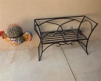 Metal bench and fishhook barrel cactus