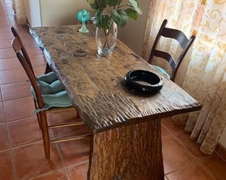 Rustic table and vintage chairs