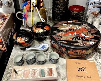 Japanese lacquered miso bowls & jar of chopsticks.