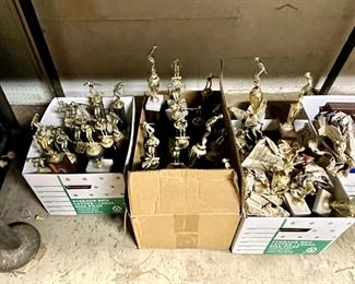Large collection of 1990s-era swimming trophies!