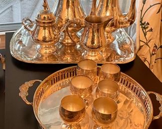 Silver plated tea service and goblets.