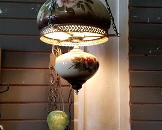Vintage lamps hanging all around store