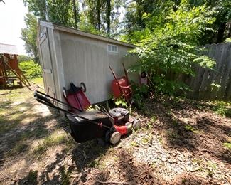 Outside items - mower, wagon, wheel barrow
