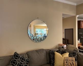 Mirror in great room over sofa