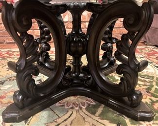 Bass of the glass top coffee table