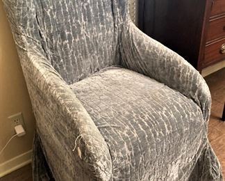 One of two chairs with slip covers