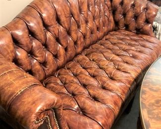 Chesterfield tufted leather sofa - Almost everyone will have seen or sat on a Chesterfield sofa at some point in their lives. First made in the late 18th century, this iconic English design has graced living rooms, offices, inns and libraries for more than two hundred years. 