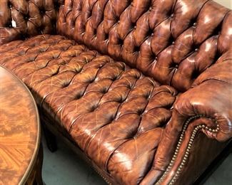 Chesterfield tufted leather sofa