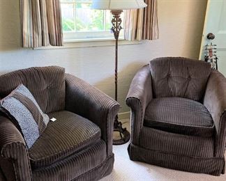 Matching brown chairs; floor lamp