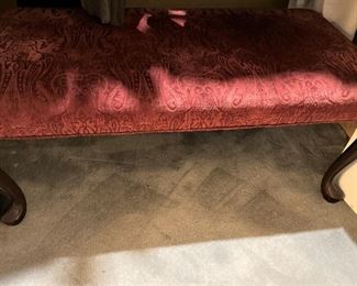 Bed bench with red upholstery 