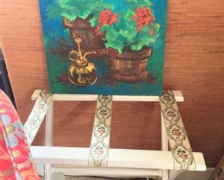 Geraniums on canvas; luggage rack 