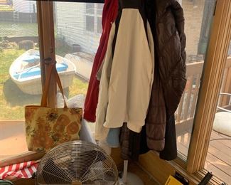 Coats, coat rack, fan