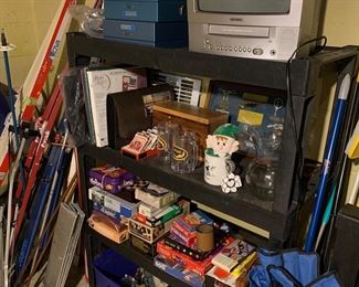 Games, vintage tv with vcr, shelving
