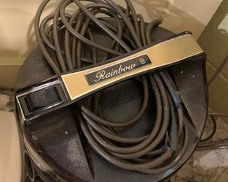 Rainbow vacuum with a slew of attachments 