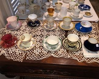 Small collection of mini cups and saucers