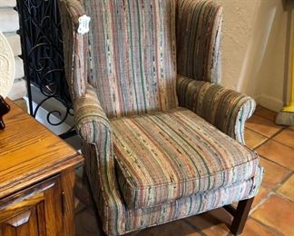 A pair of these wing back chairs