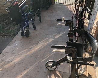 several wheeled home health / handicap assists