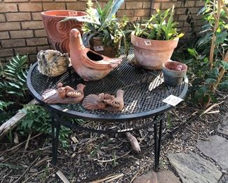 patio table and pottery