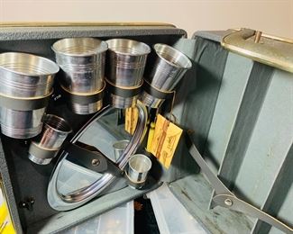 A 1961 era portable bar complete with key and 1960s graphics. Fun and groovy.