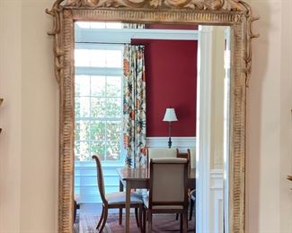 Carved Wood Parcel Gilt Mirror. Measures 23" x 41" H. Photo 1 of 4.